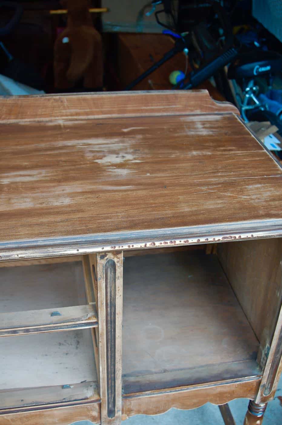 how to use milkpaint to distress an old thrifted sideboard.