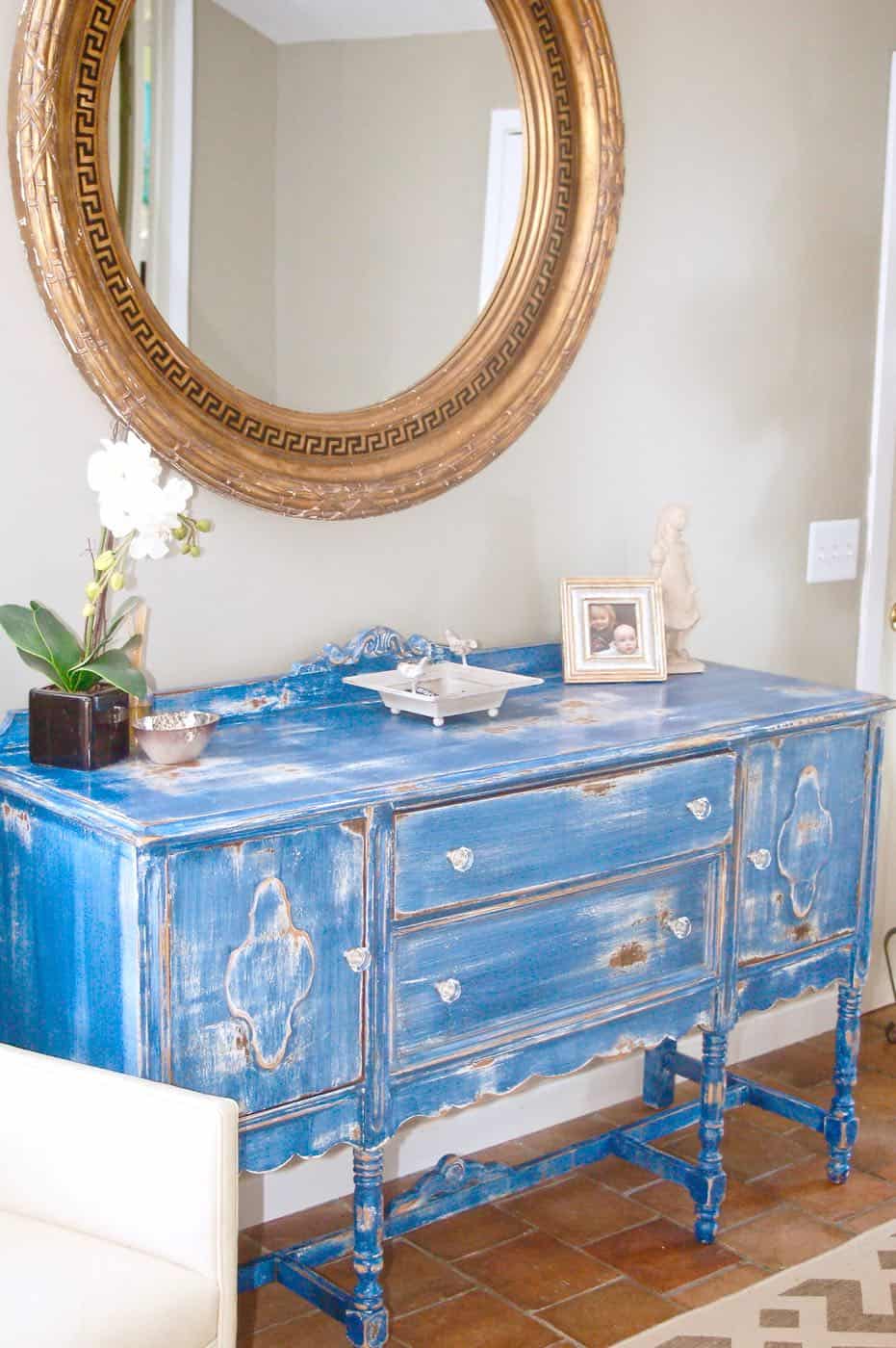 how to use milkpaint to distress an old thrifted sideboard.