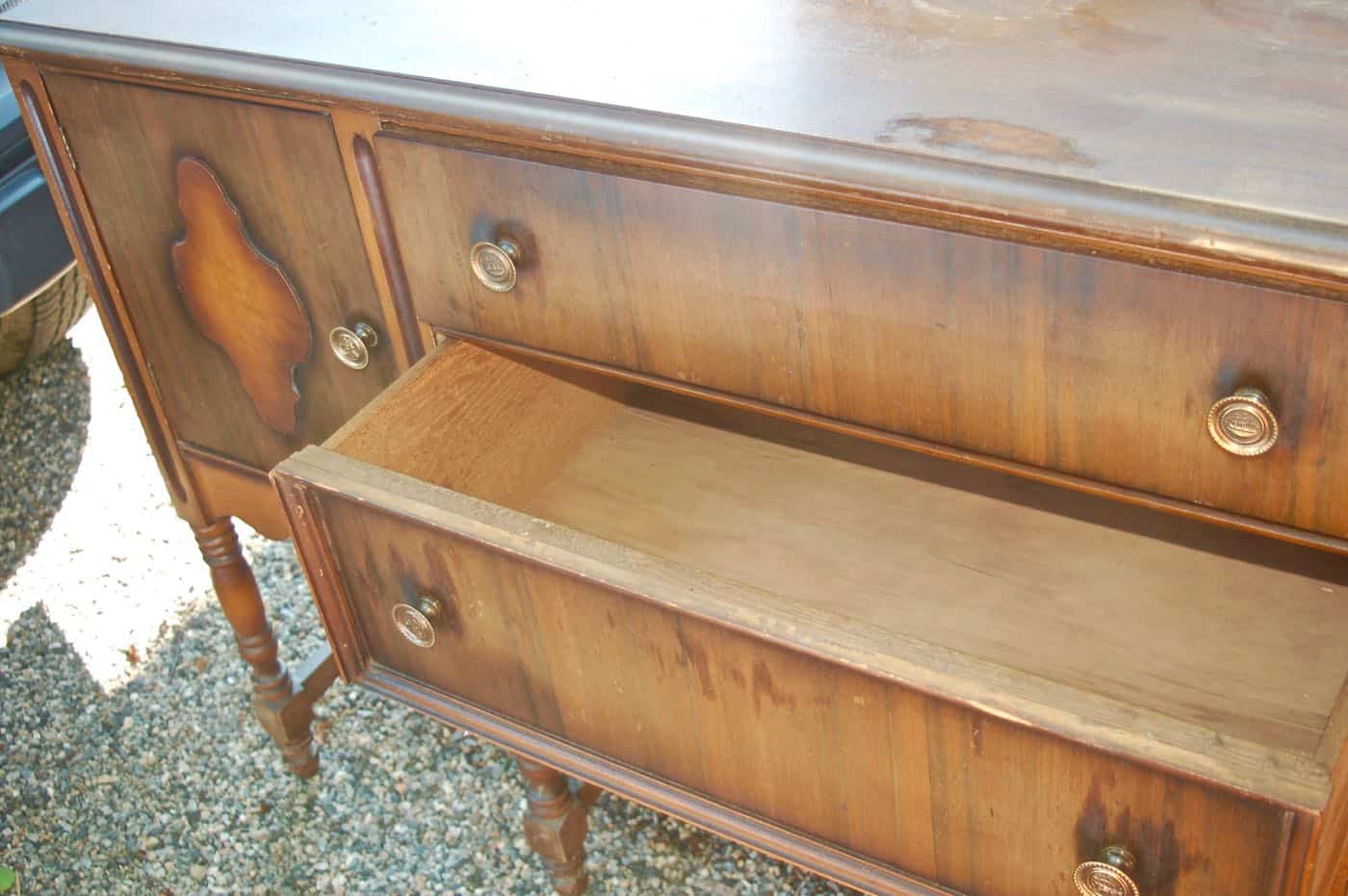 how to use milkpaint to distress an old thrifted sideboard.