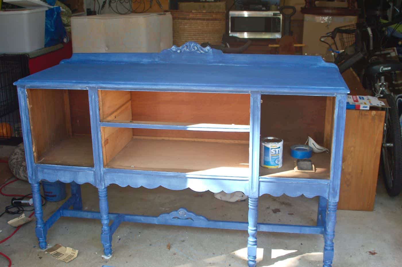 how to use milkpaint to distress an old thrifted sideboard.