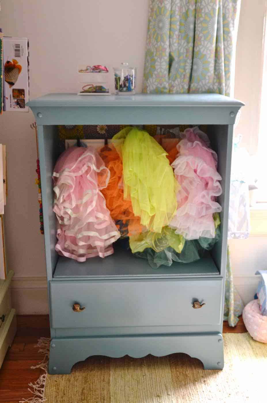 Turning a Craigslist dresser into kids dress-up storage.