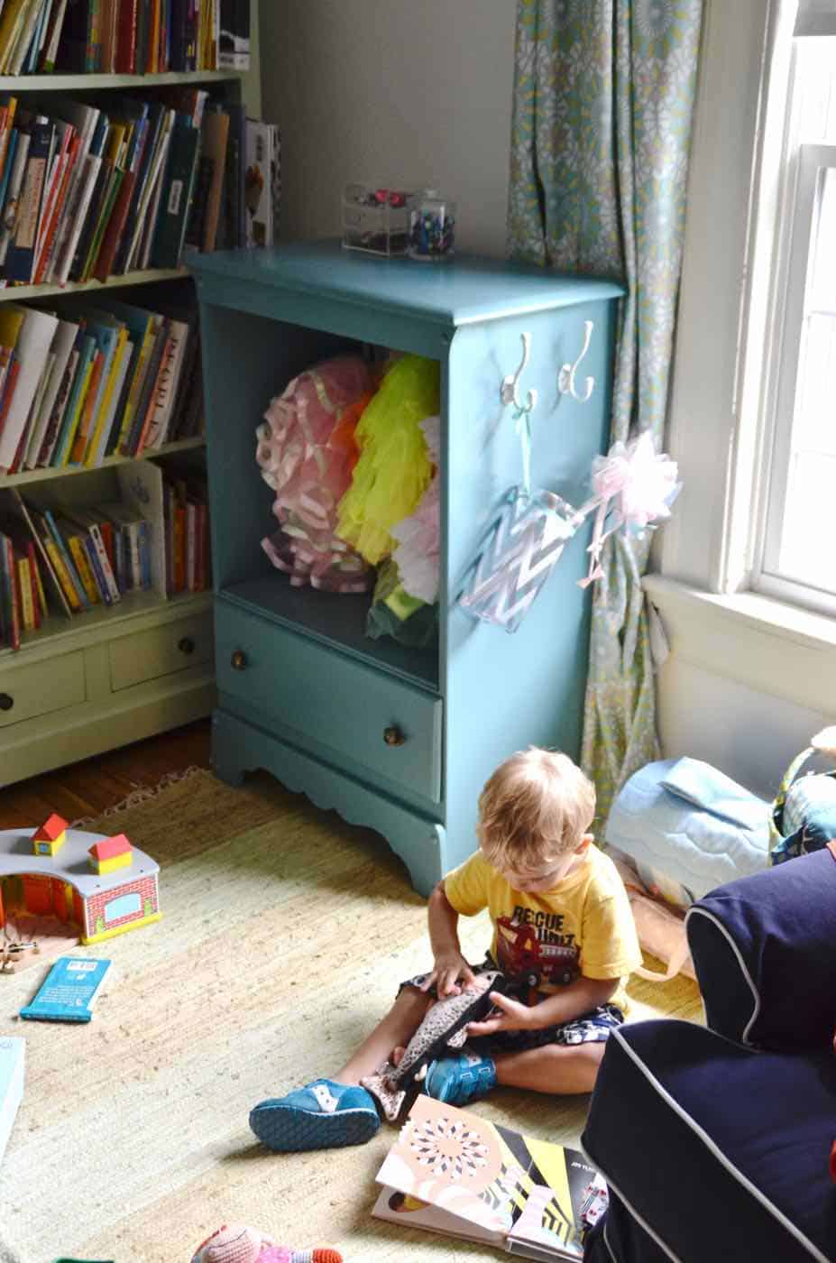 Turning a Craigslist dresser into kids dress-up storage.