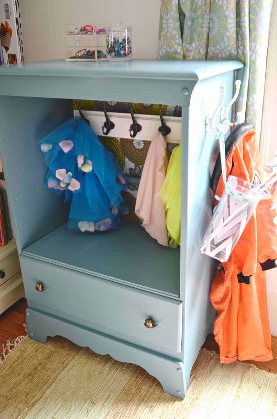 Turning a Craigslist dresser into kids dress-up storage.