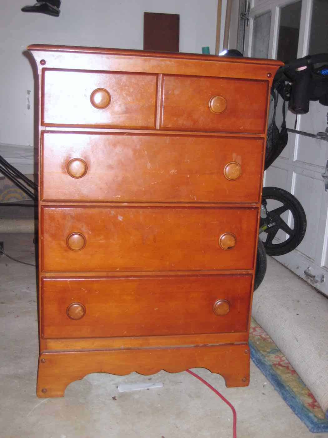 Turning a Craigslist dresser into kids dress-up storage.