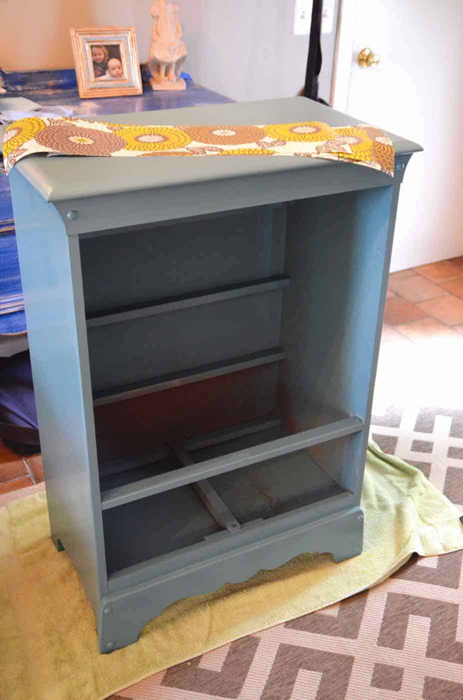 Turning a Craigslist dresser into kids dress-up storage.