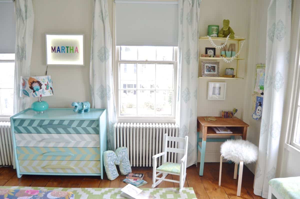 Colorful striped repainted Craigslist dresser