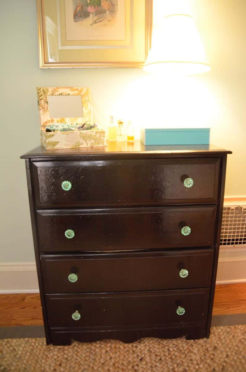 Old bureau gets a fresh look and is now a colorful striped dresser for the master bedroom. 