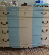 Old bureau gets a fresh look and is now a colorful striped dresser for the master bedroom.