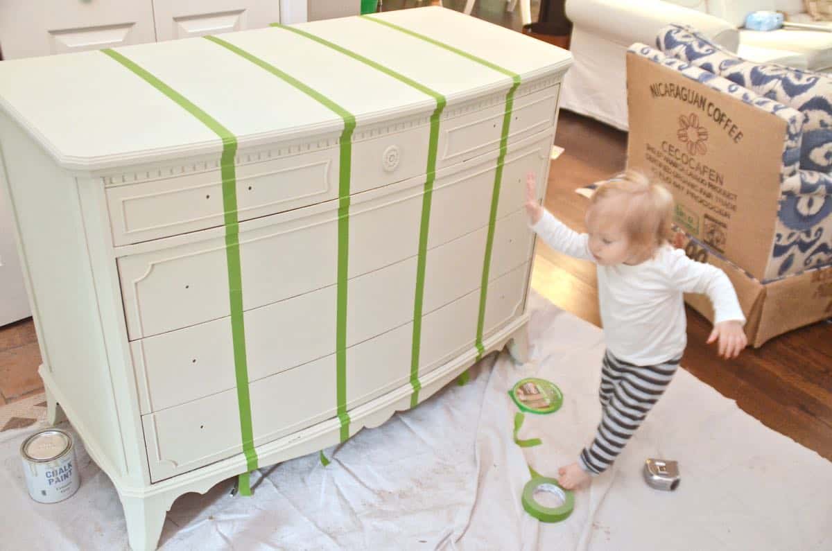 Old bureau gets a fresh look and is now a colorful striped dresser for the master bedroom. 