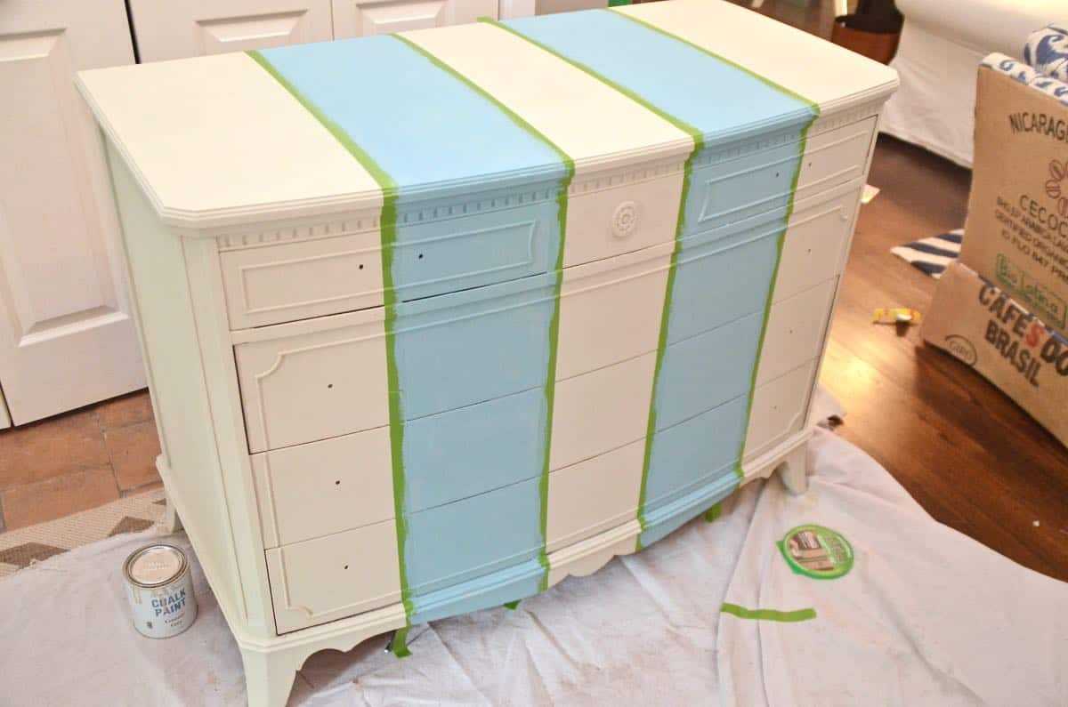 Old bureau gets a fresh look and is now a colorful striped dresser for the master bedroom. 