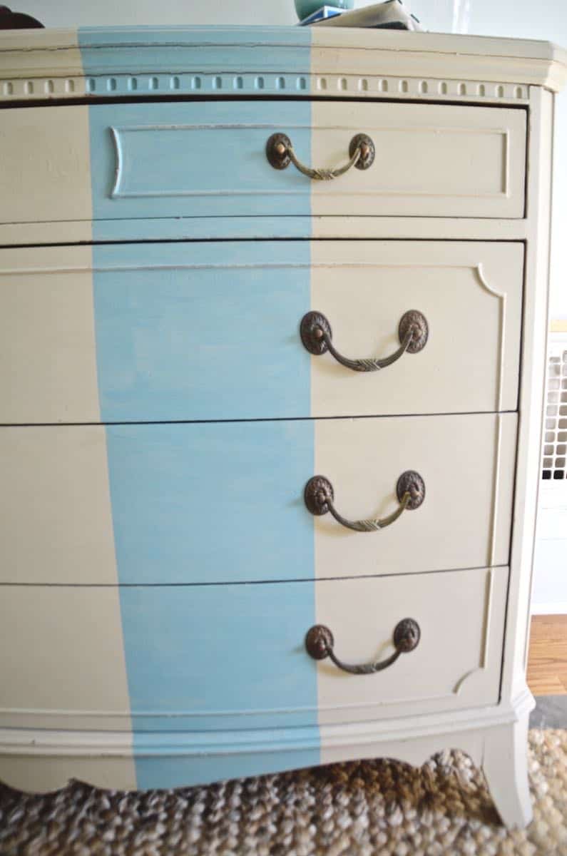 Old bureau gets a fresh look and is now a colorful striped dresser for the master bedroom. 