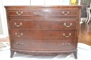 Old bureau gets a fresh look and is now a colorful striped dresser for the master bedroom.