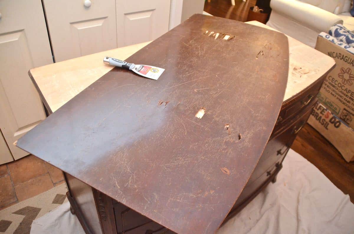 Old bureau gets a fresh look and is now a colorful striped dresser for the master bedroom. 