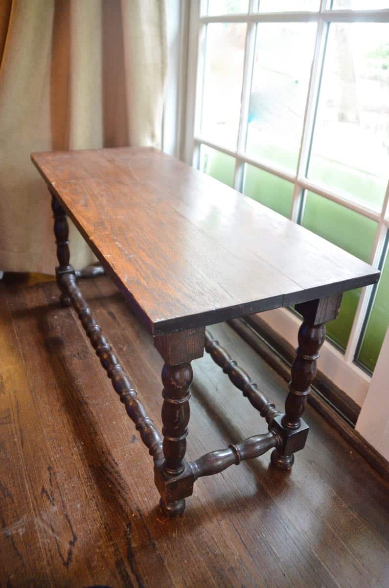 Upholstering a plain bench with a throw rug.