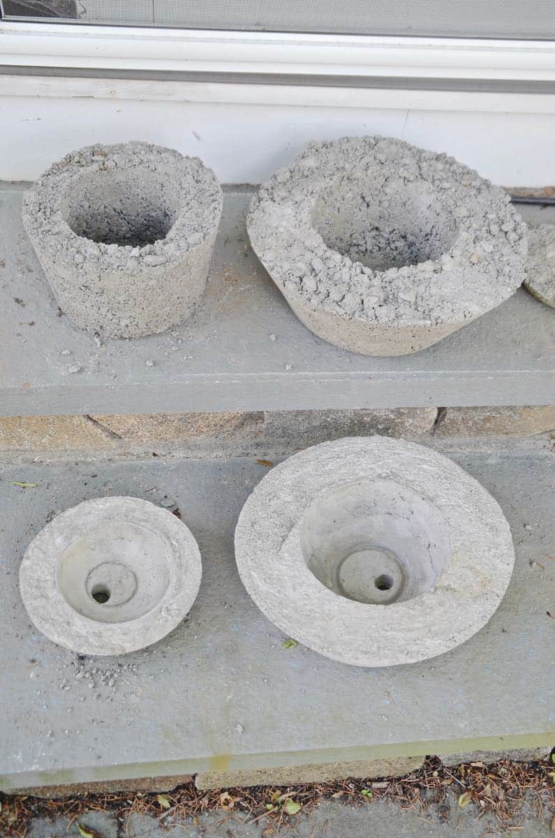 Save lots of money by making your own chic and modern concrete planters with this easy tutorial.