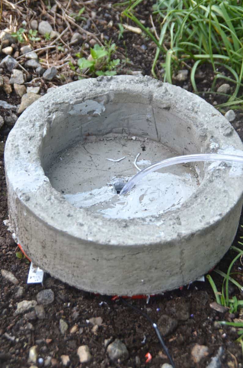 Make a bubbling concrete orb backyard fountain.
