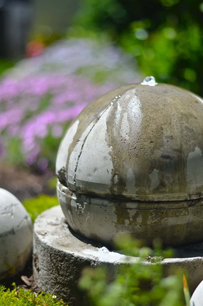 Make a bubbling concrete orb backyard fountain.