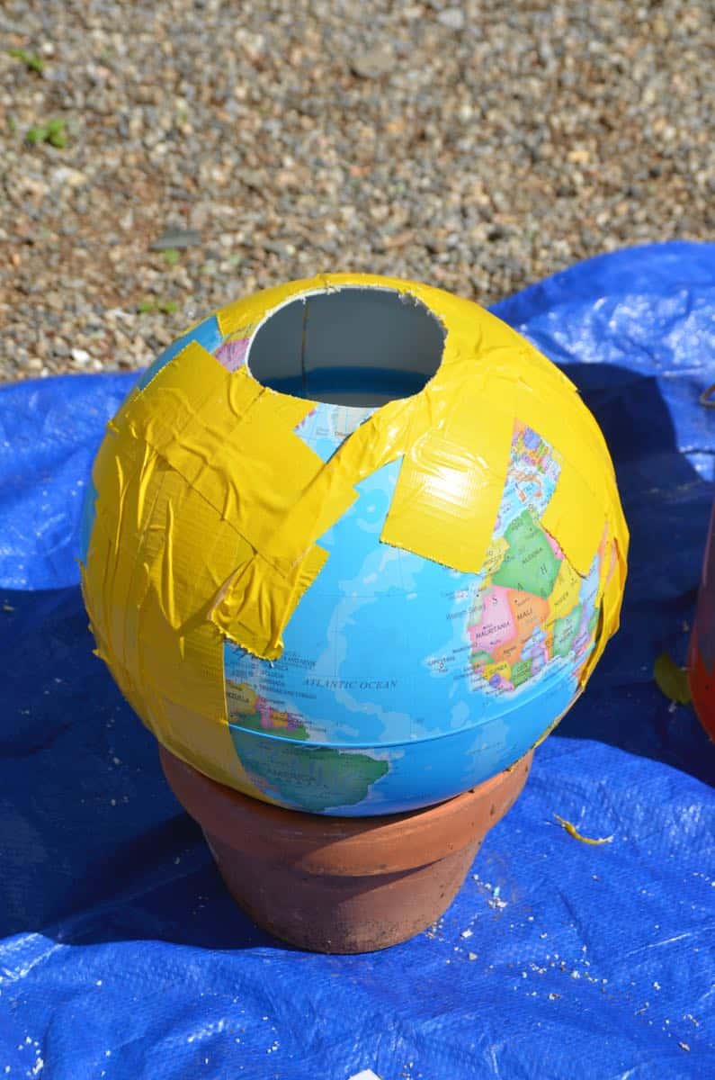 Make a bubbling concrete orb backyard fountain.