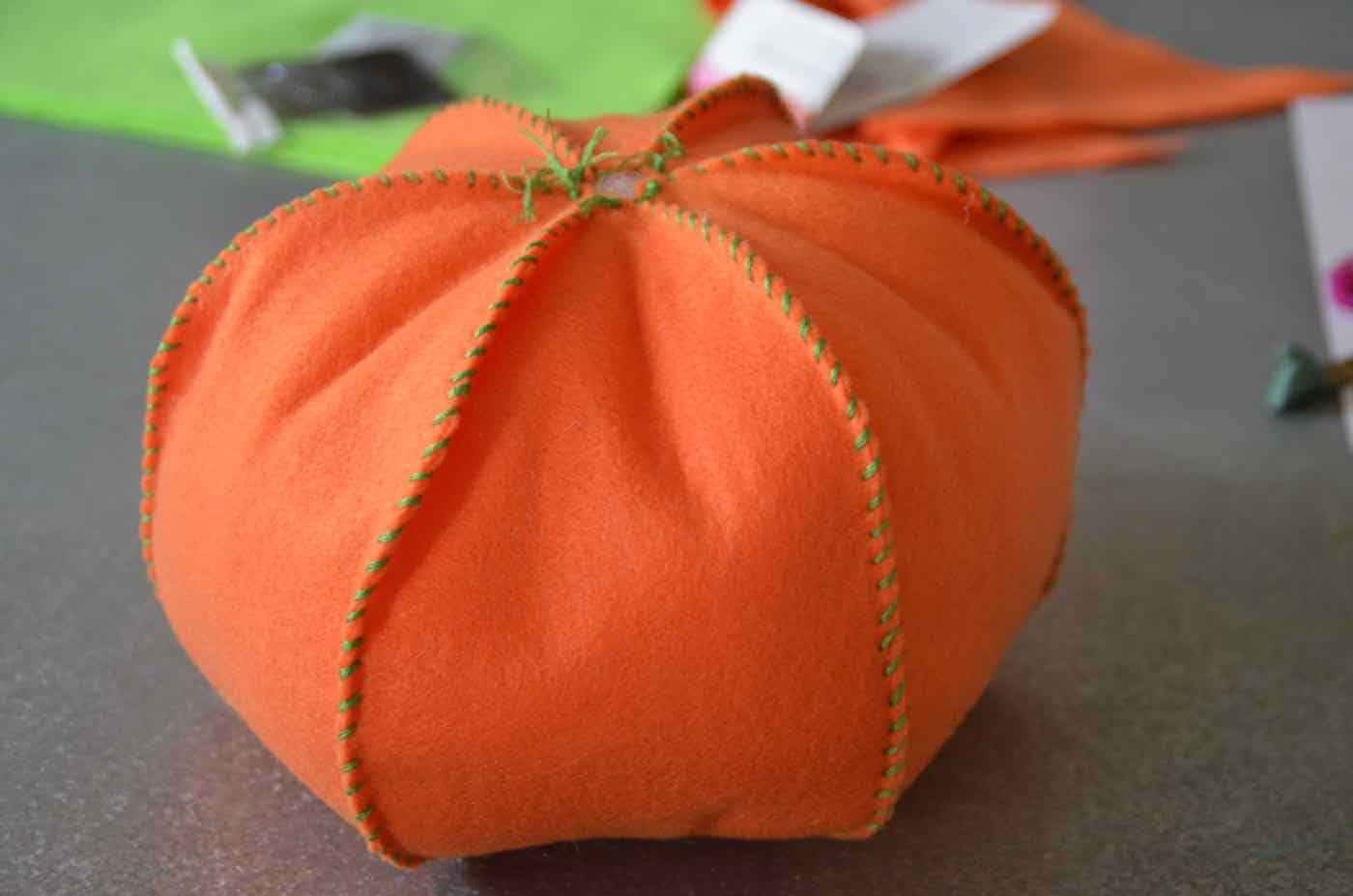 Stuffed pumpkins made from scrap fabric all ready for Halloween decor.