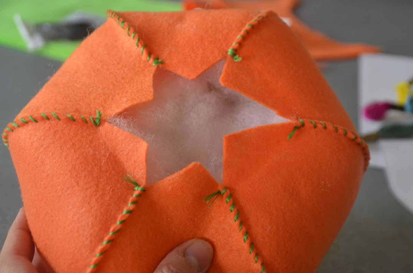 Stuffed pumpkins made from scrap fabric all ready for Halloween decor.