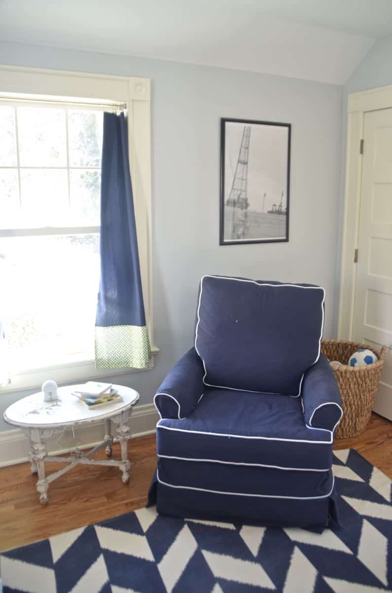 Mixing pattern and flea market treasures in our navy blue guest room.
