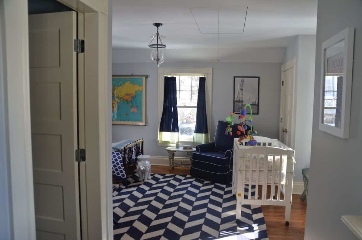 Mixing pattern and flea market treasures in our navy blue guest room.