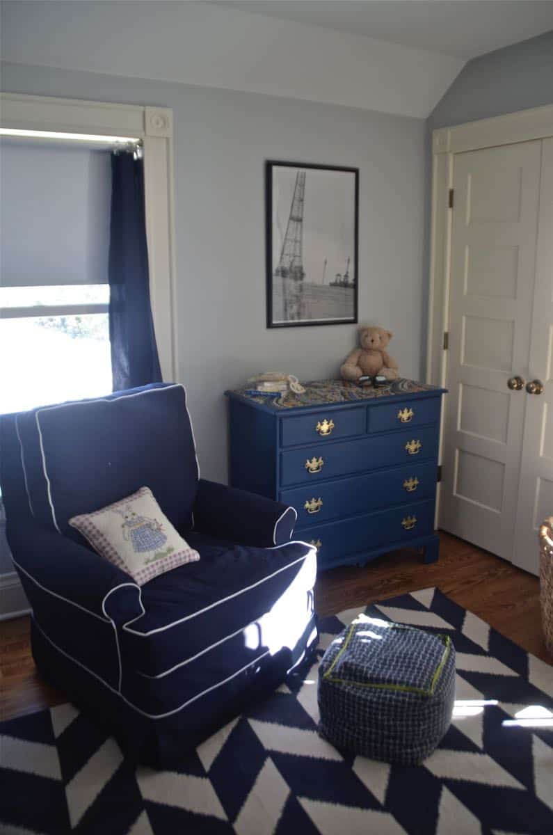 Mixing pattern and flea market treasures in our navy blue guest room.