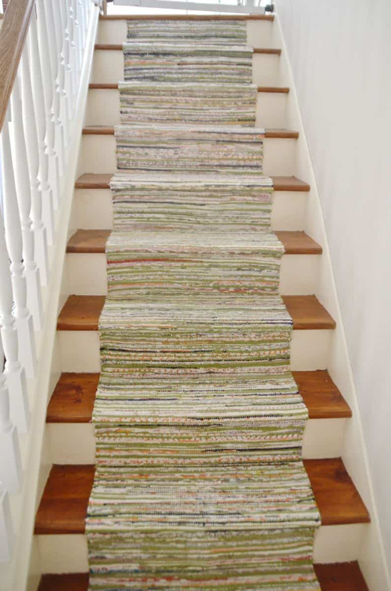 https://atcharlotteshouse.com/wp-content/uploads/2014/01/Ikea-Throw-Rug-Turned-Staircase-Runner-10.jpg