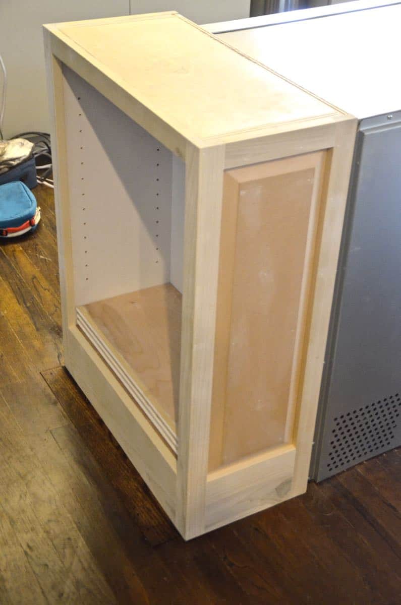 Thrifted kitchen cabinet is put to use as a functional new kitchen island.