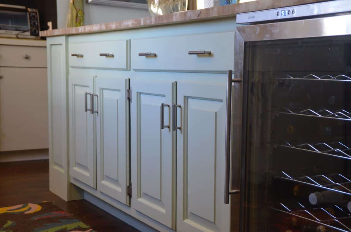 Thrifted kitchen cabinet is put to use as a functional new kitchen island.