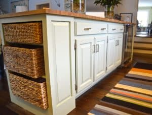 Thrifted kitchen cabinet is put to use as a functional new kitchen island.