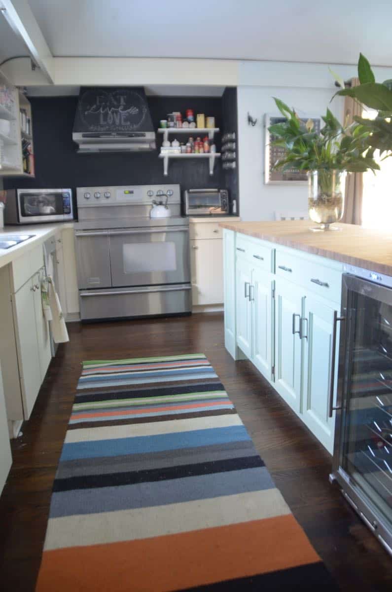 Thrifted kitchen cabinet is put to use as a functional new kitchen island.