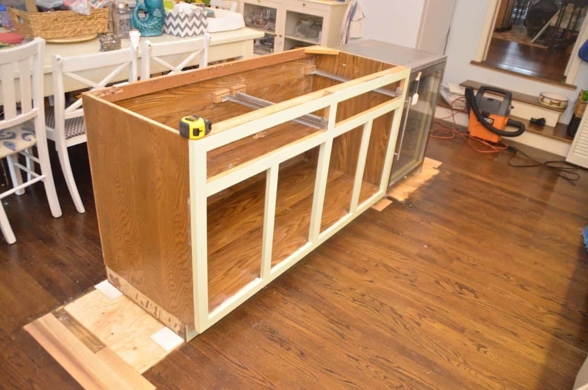 Thrifted kitchen cabinet is put to use as a functional new kitchen island.