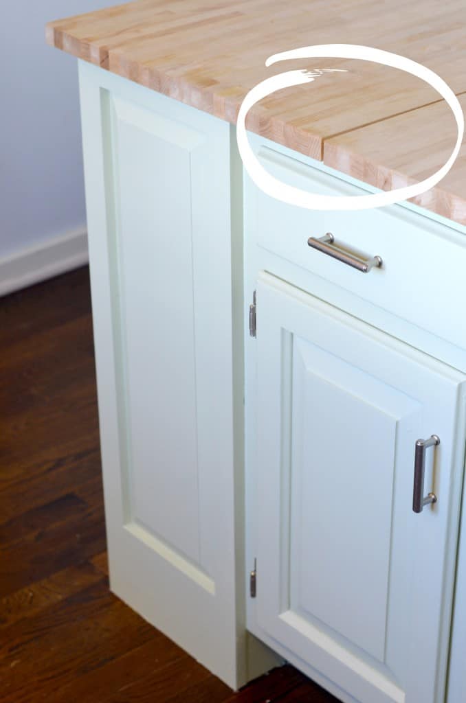 Thrifted kitchen cabinet is put to use as a functional new kitchen island.