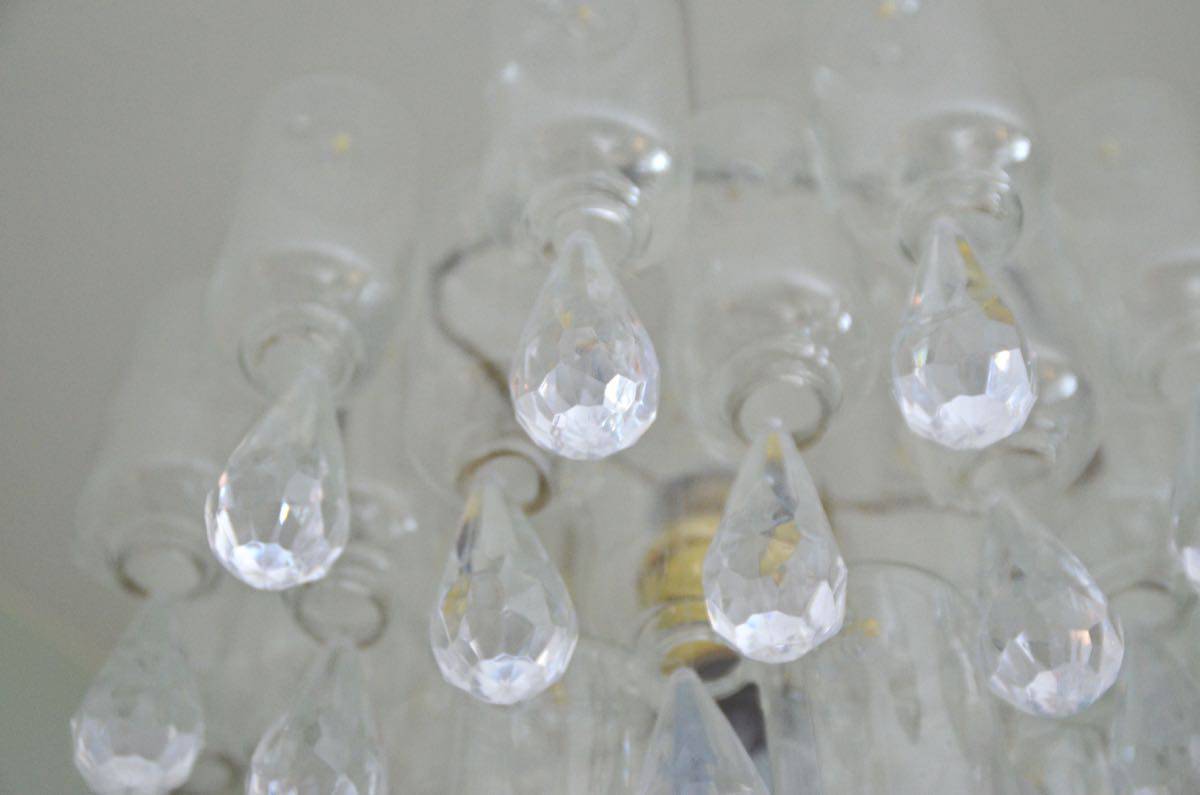 These plastic dollar store bottles were transformed into a fun and decorative chandelier