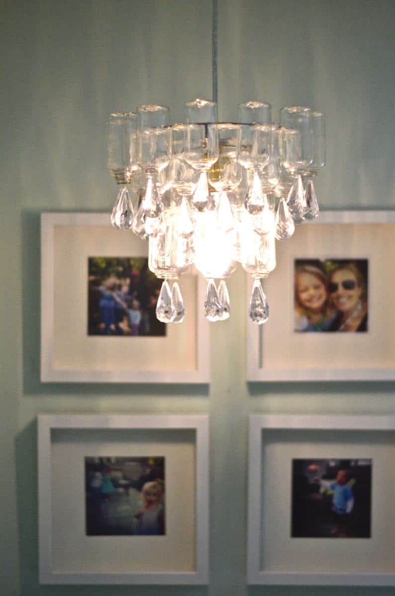 These plastic dollar store bottles were transformed into a fun and decorative chandelier