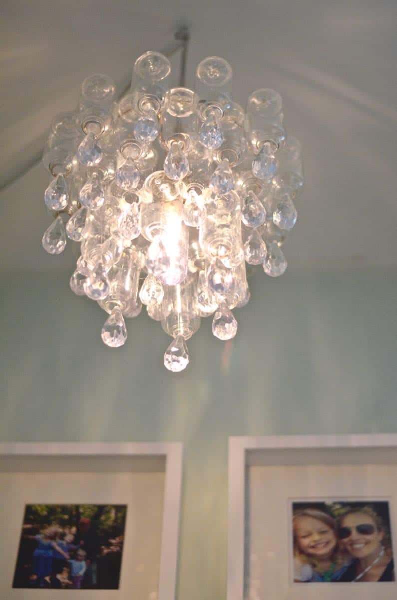 These plastic dollar store bottles were transformed into a fun and decorative chandelier