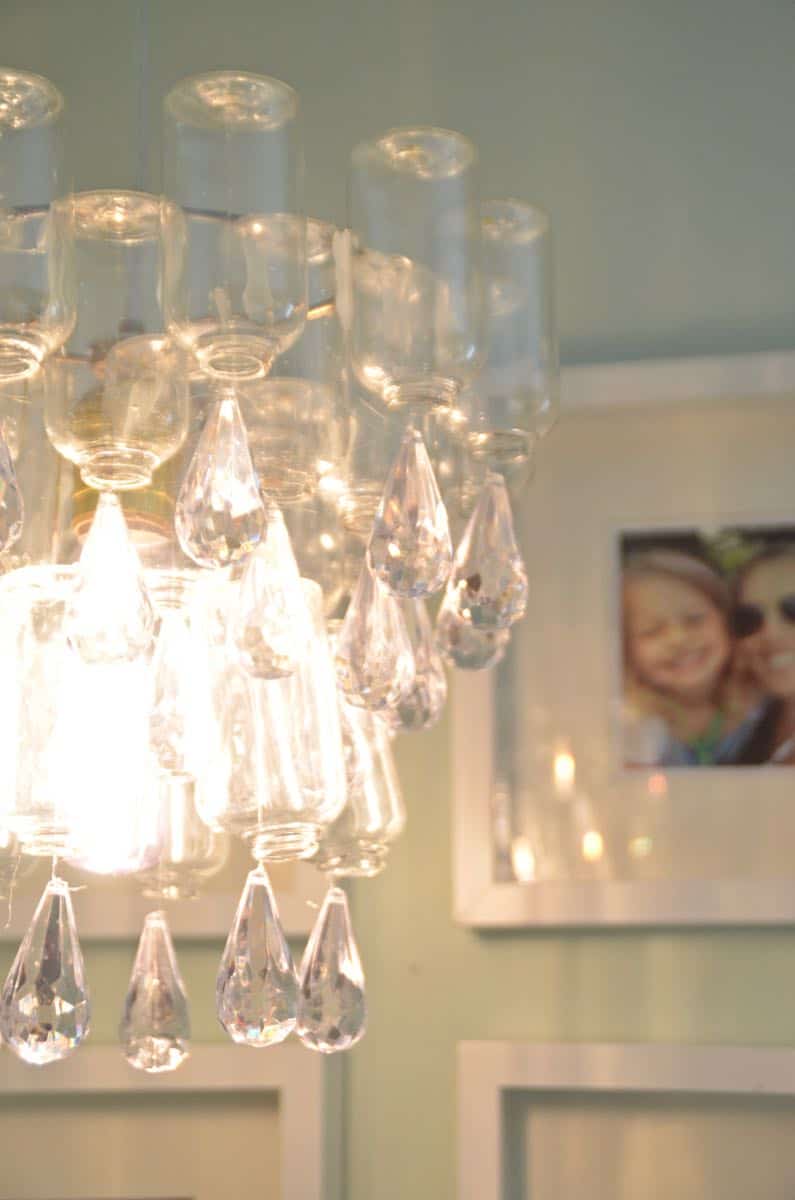 These plastic dollar store bottles were transformed into a fun and decorative chandelier