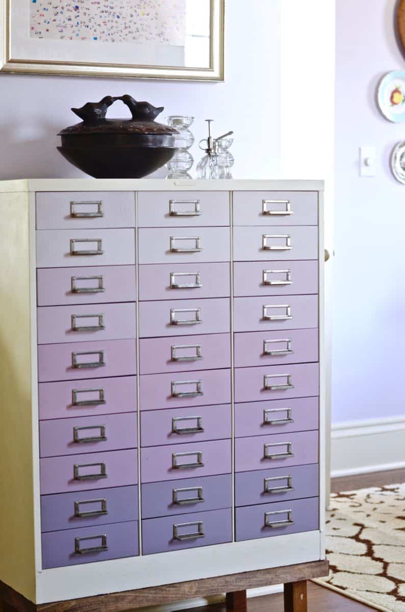 A plain industrial file cabinet is transformed thanks to an ombre paint treatment and a new DIY base.