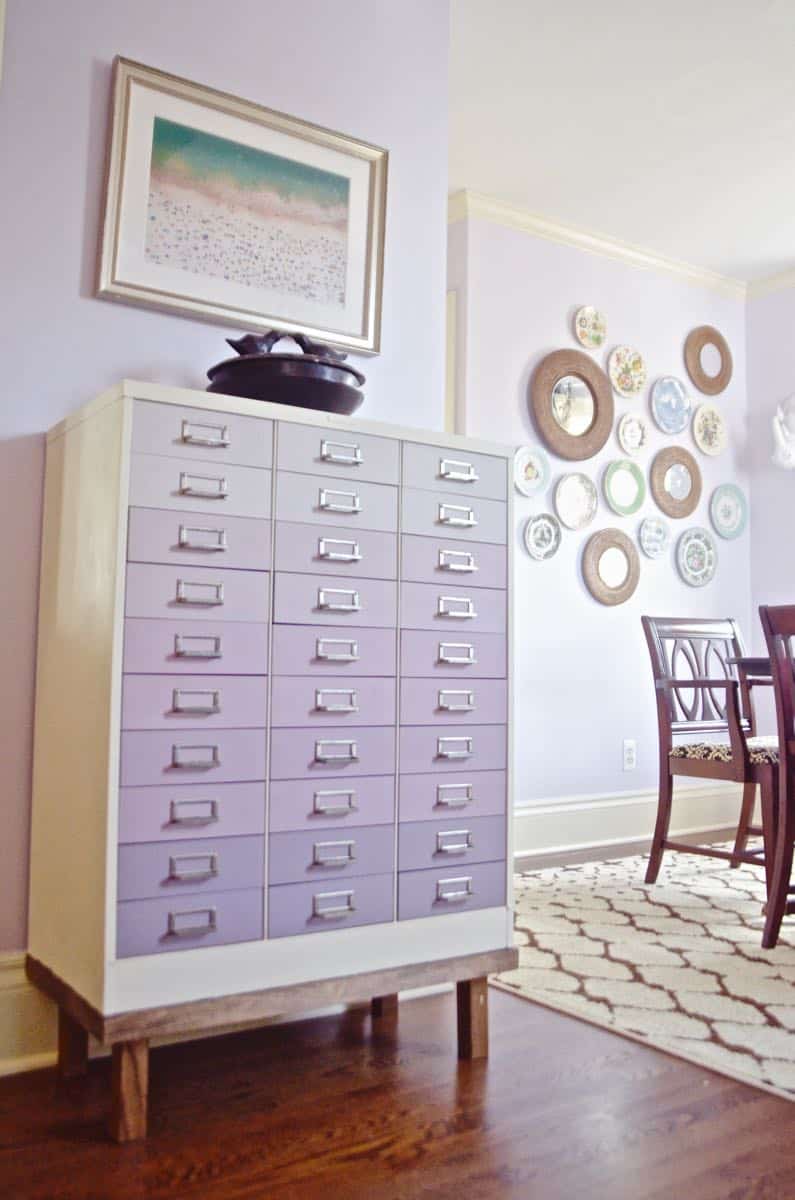 A plain industrial file cabinet is transformed thanks to an ombre paint treatment and a new DIY base.