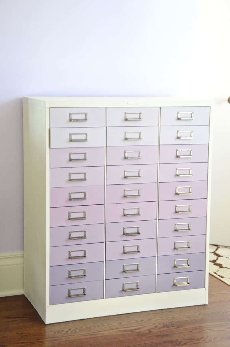 A plain industrial file cabinet is transformed thanks to an ombre paint treatment and a new DIY base.