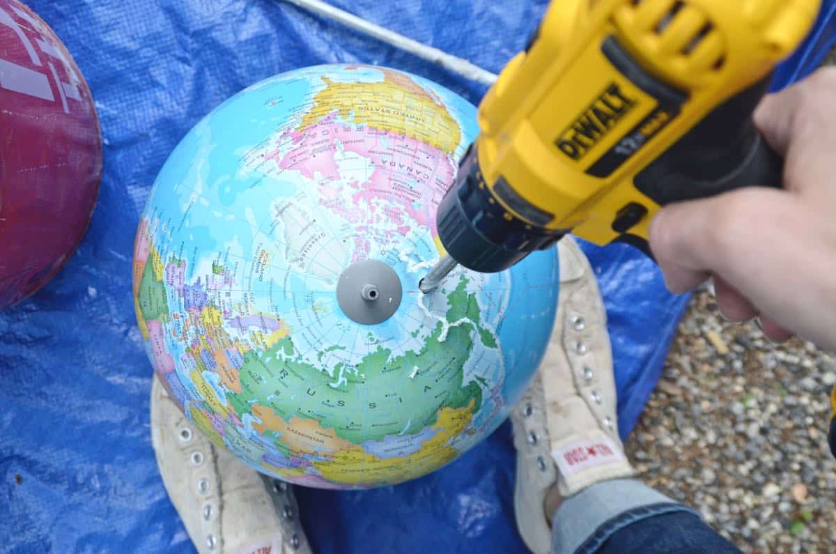 Make a bubbling concrete orb backyard fountain.