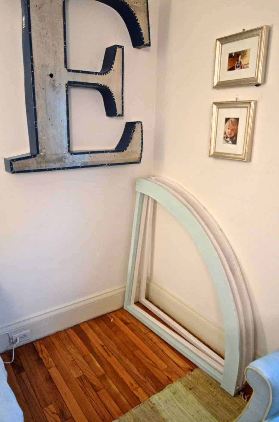 Simple and inexpensive corner reading nook using plywood and paint.