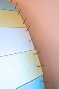 Simple and inexpensive corner reading nook using plywood and paint.
