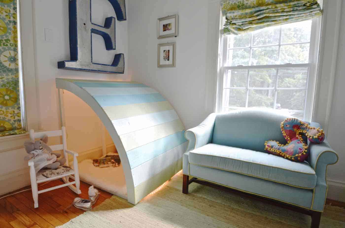 Simple and inexpensive corner reading nook using plywood and paint.