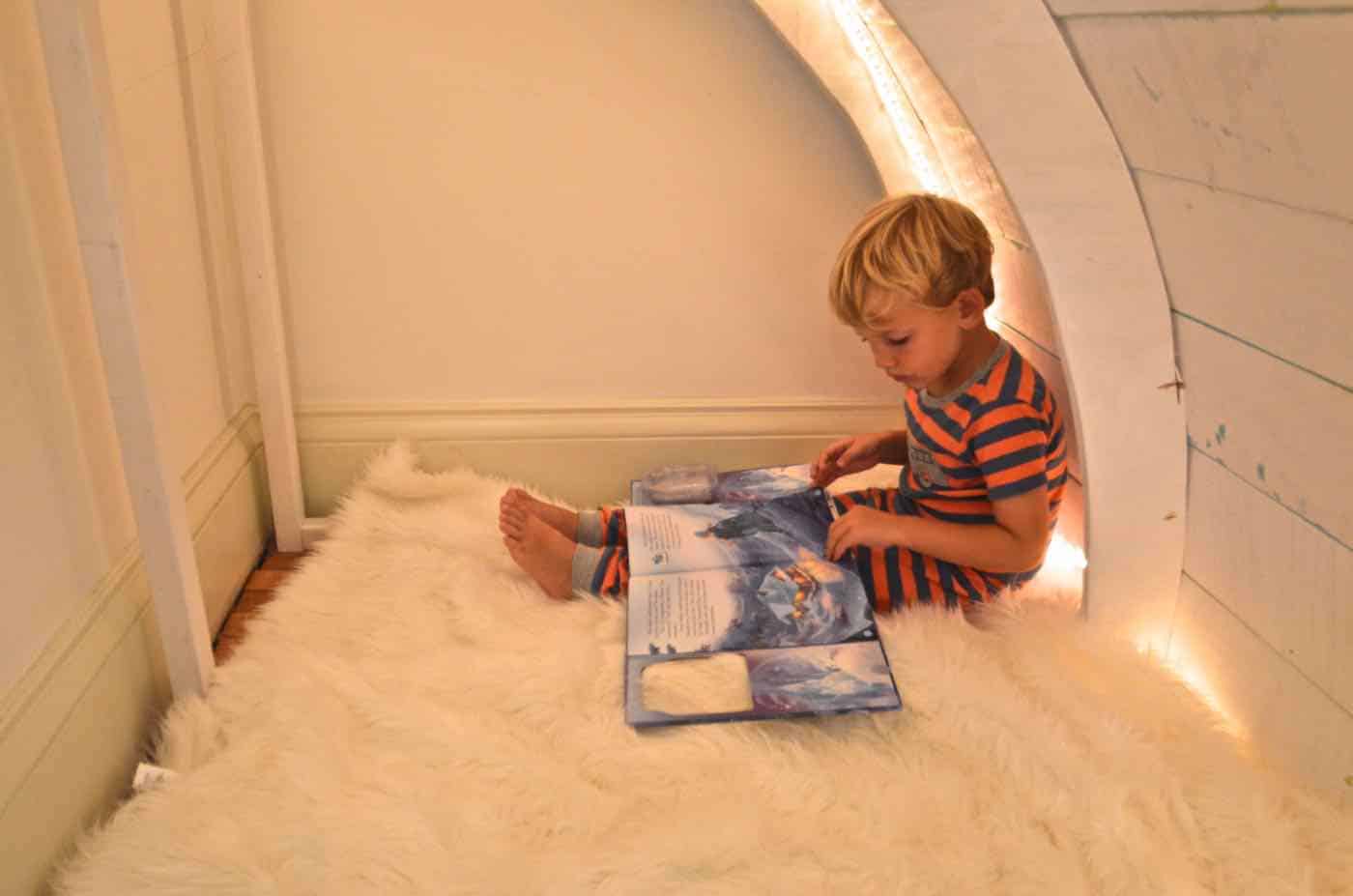 Simple and inexpensive corner reading nook using plywood and paint.