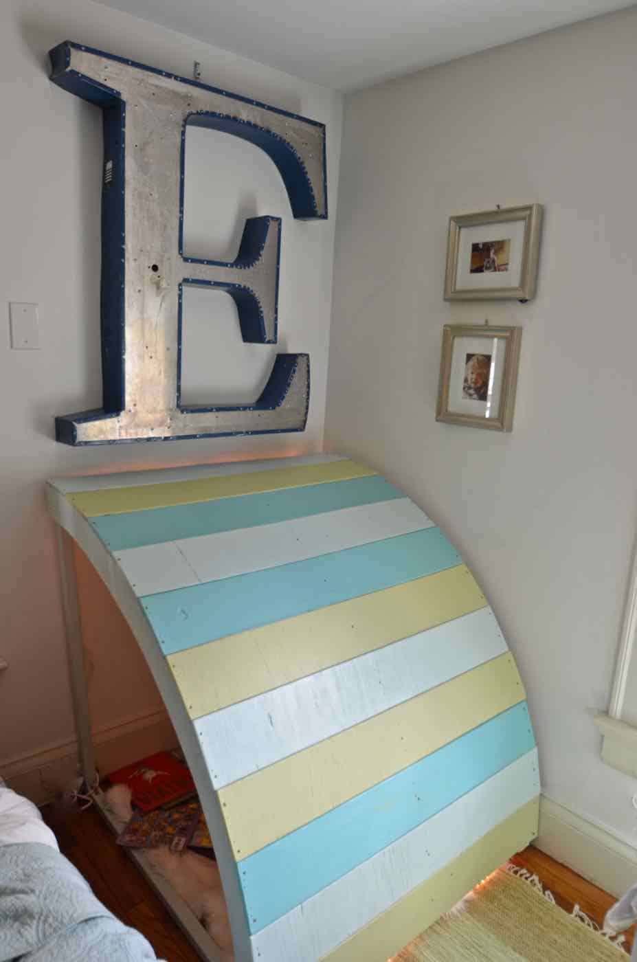 Simple and inexpensive corner reading nook using plywood and paint.