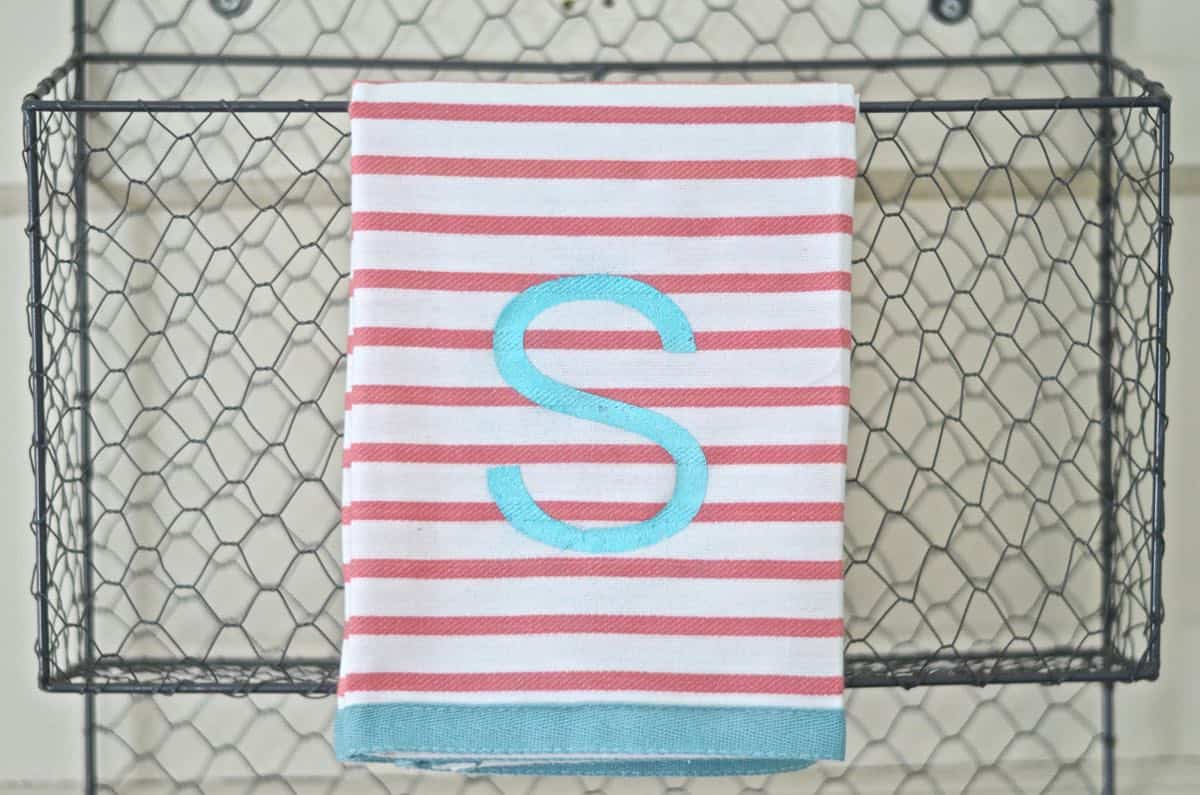 Embossed monogrammed hand towel.