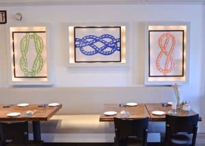 Neighborhood New England restaurant gets a nautical and chic makeover on a big time budget.