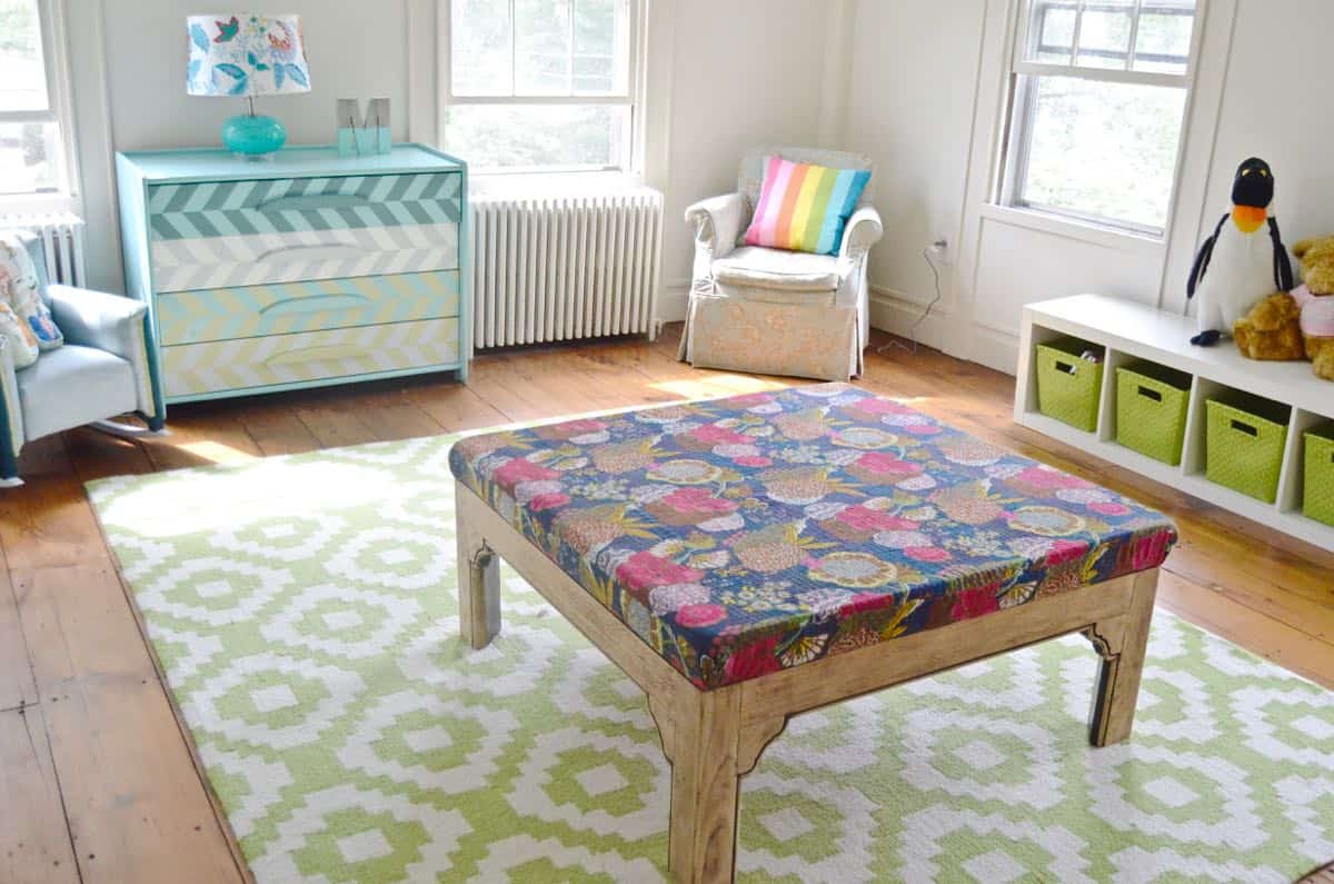 Turn a basic coffee table into an upholstered ottoman.